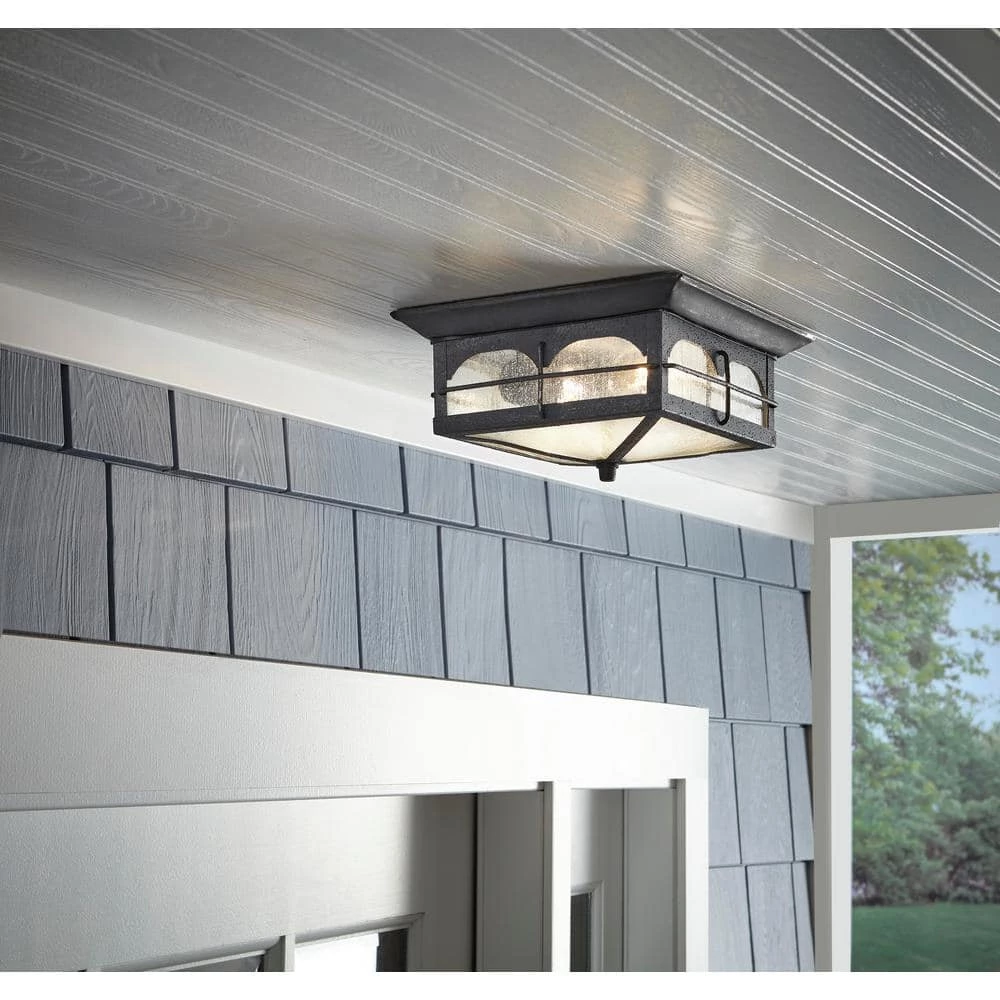 Home Decorators Collection Brimfield 11 in. Aged Iron 2 Light Outdoor Ceiling Flush Mount Light with Clear Seedy Glass Shade 4 Home Decorators Collection Brimfield 11 in. Aged Iron 2 Light Outdoor Ceiling Flush Mount Light with Clear Seedy Glass Shade - Image 2