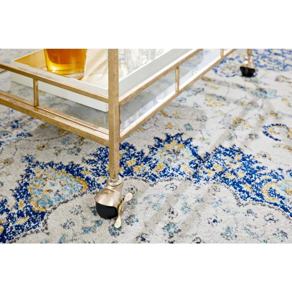 Home Decorators Collection Gold Leaf Metal and Glass Rolling Bar Cart with Glass Top (30 in. W x 33 in. H) 5 Home Decorators Collection Gold Leaf Metal and Glass Rolling Bar Cart with Glass Top (30 in. W x 33 in. H) - Image 3