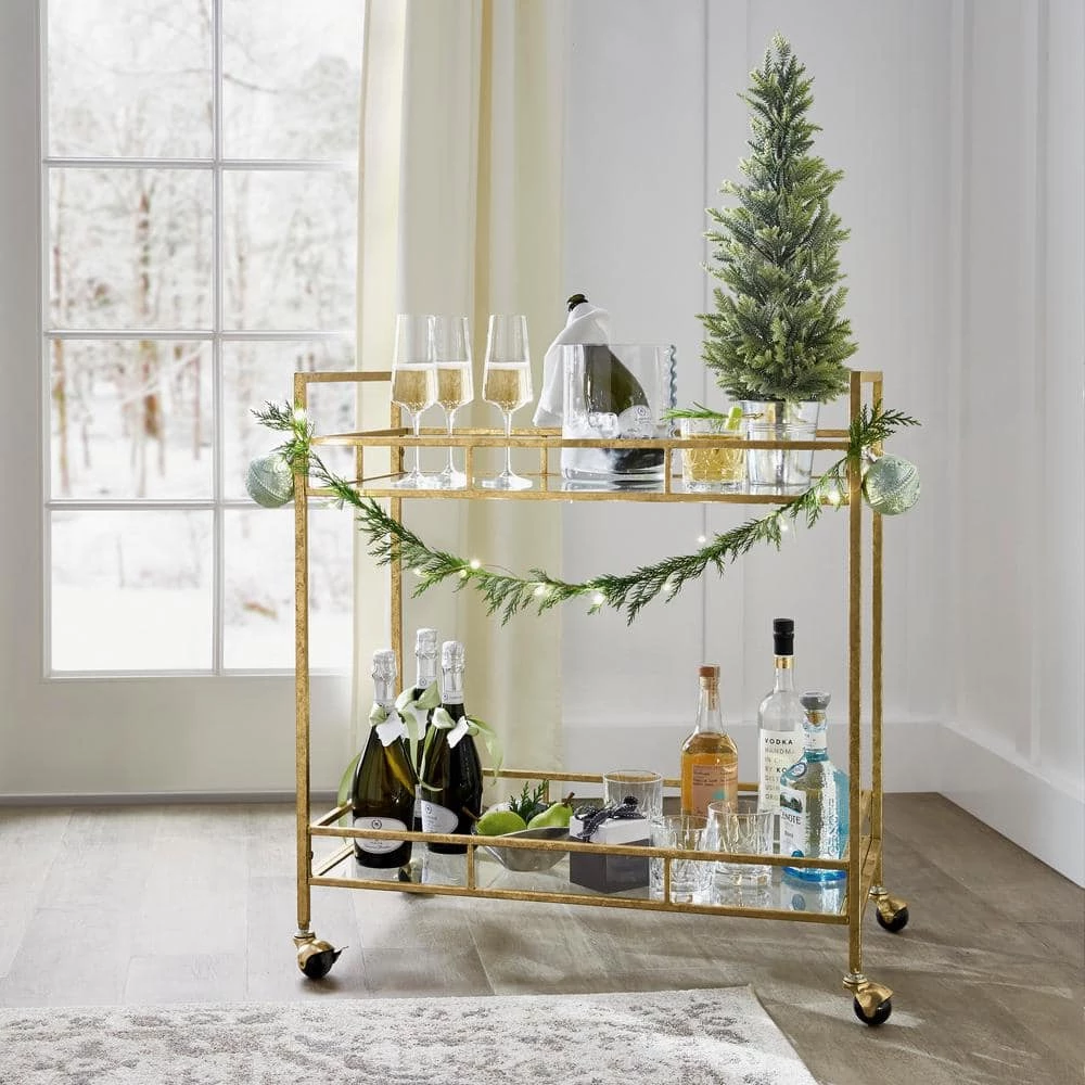 Home Decorators Collection Gold Leaf Metal and Glass Rolling Bar Cart with Glass Top (30 in. W x 33 in. H) 10 Home Decorators Collection Gold Leaf Metal and Glass Rolling Bar Cart with Glass Top (30 in. W x 33 in. H) - Image 8