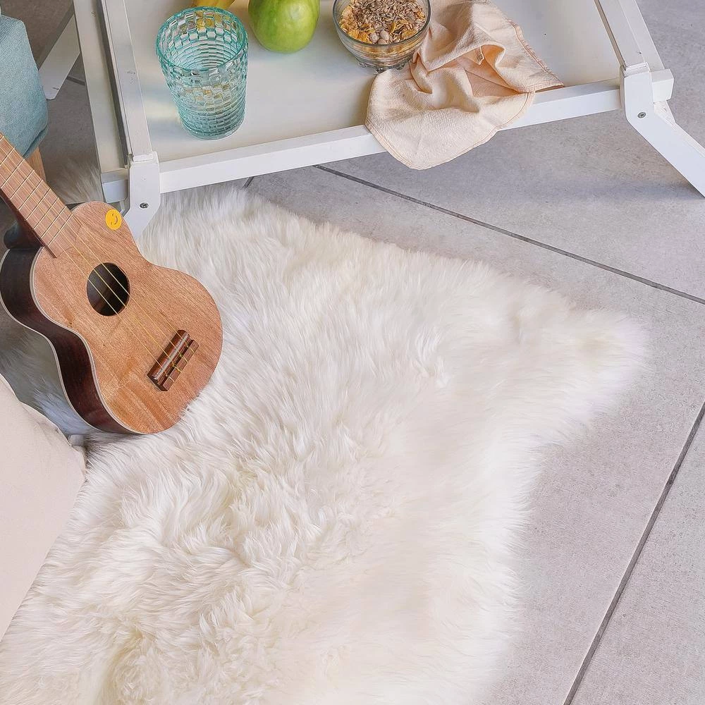 Home Decorators Collection Unshorn Sheepskin White 2 ft. x 3 ft. Animal Shape Area Rug 7 Home Decorators Collection Unshorn Sheepskin White 2 ft. x 3 ft. Animal Shape Area Rug - Image 5